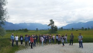 Group photo, mountains in the background