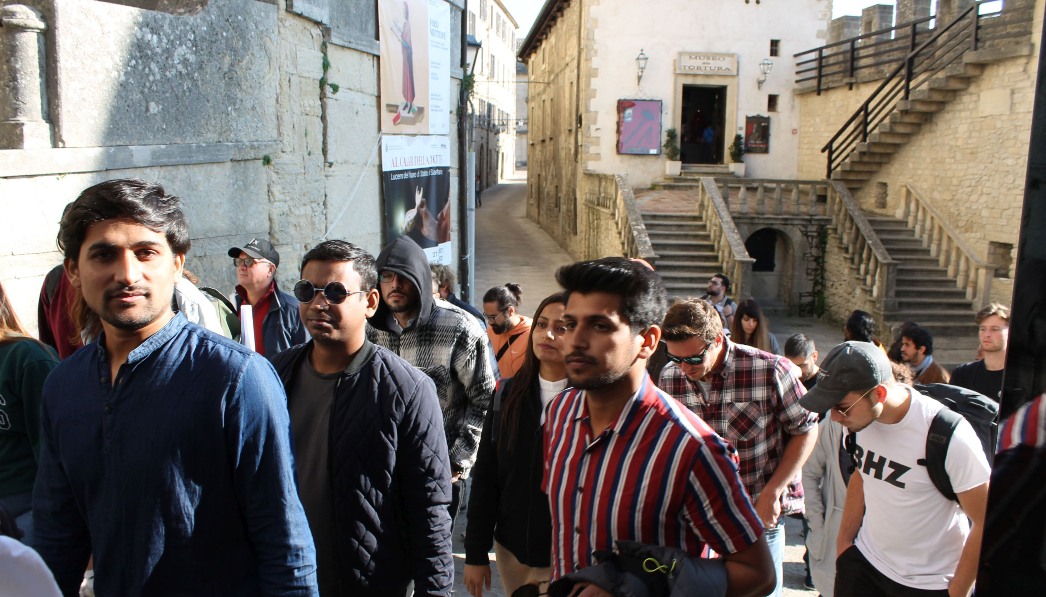 Photo group of students, background alley, stairs, building