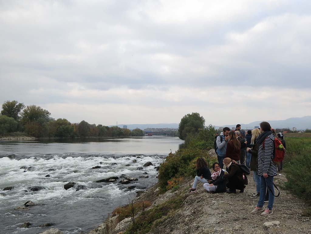 Students explore the embankments and the landscape along the Sava River