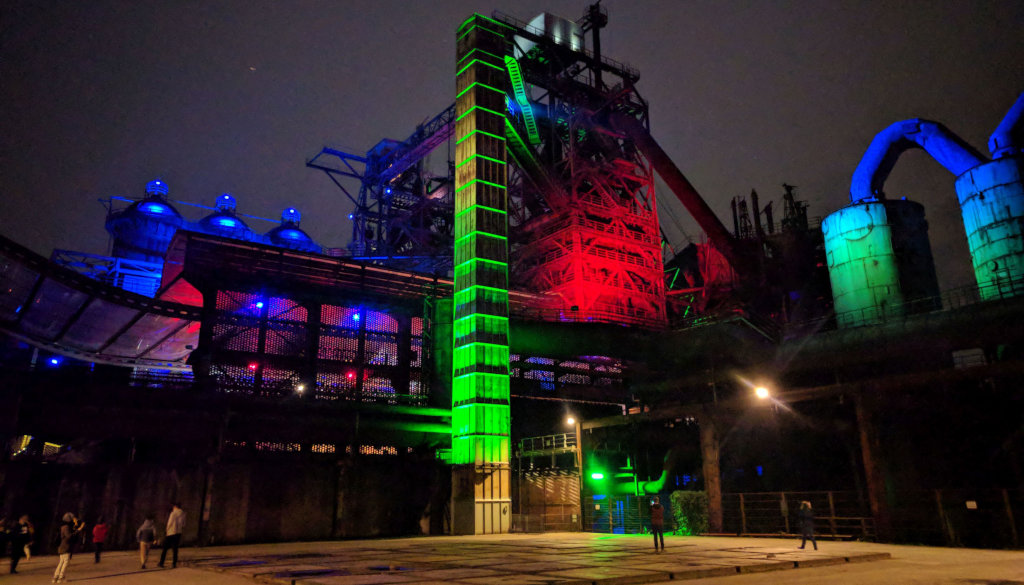 photo place with metal plates steel construction in the background illuminated with different colours